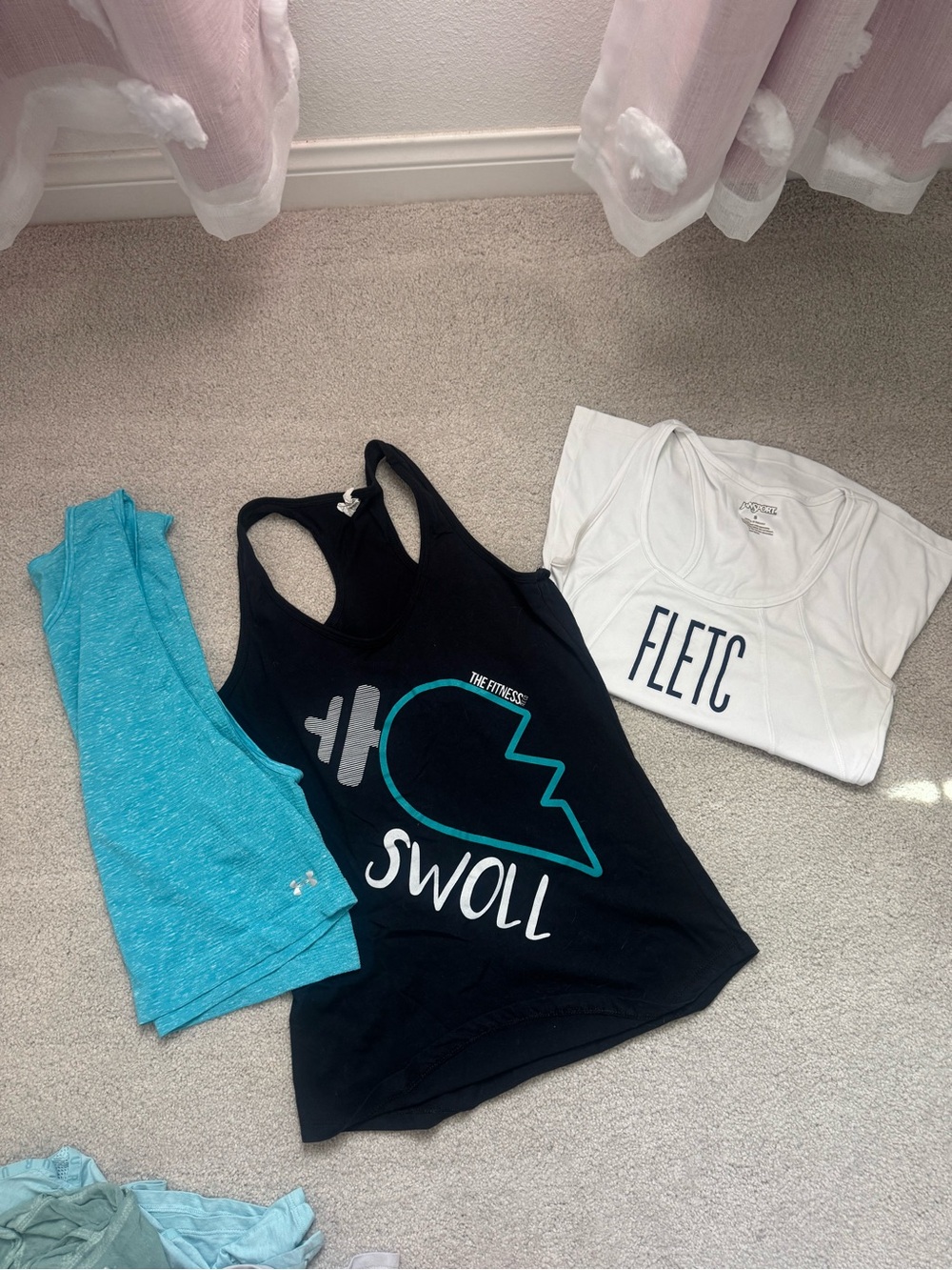 Mix bunch of workout tanks, size small